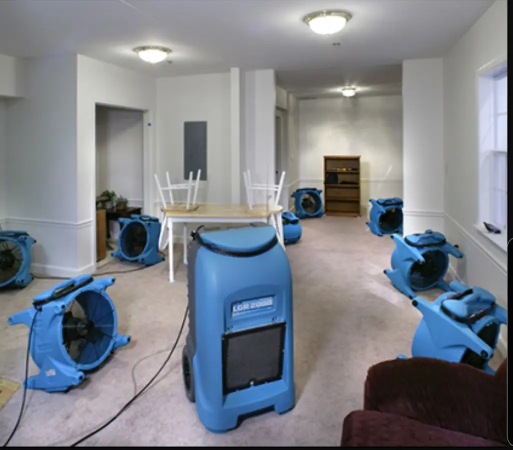 Air movers and dehumidifier setup for Water Extraction & Removal in Triangle
